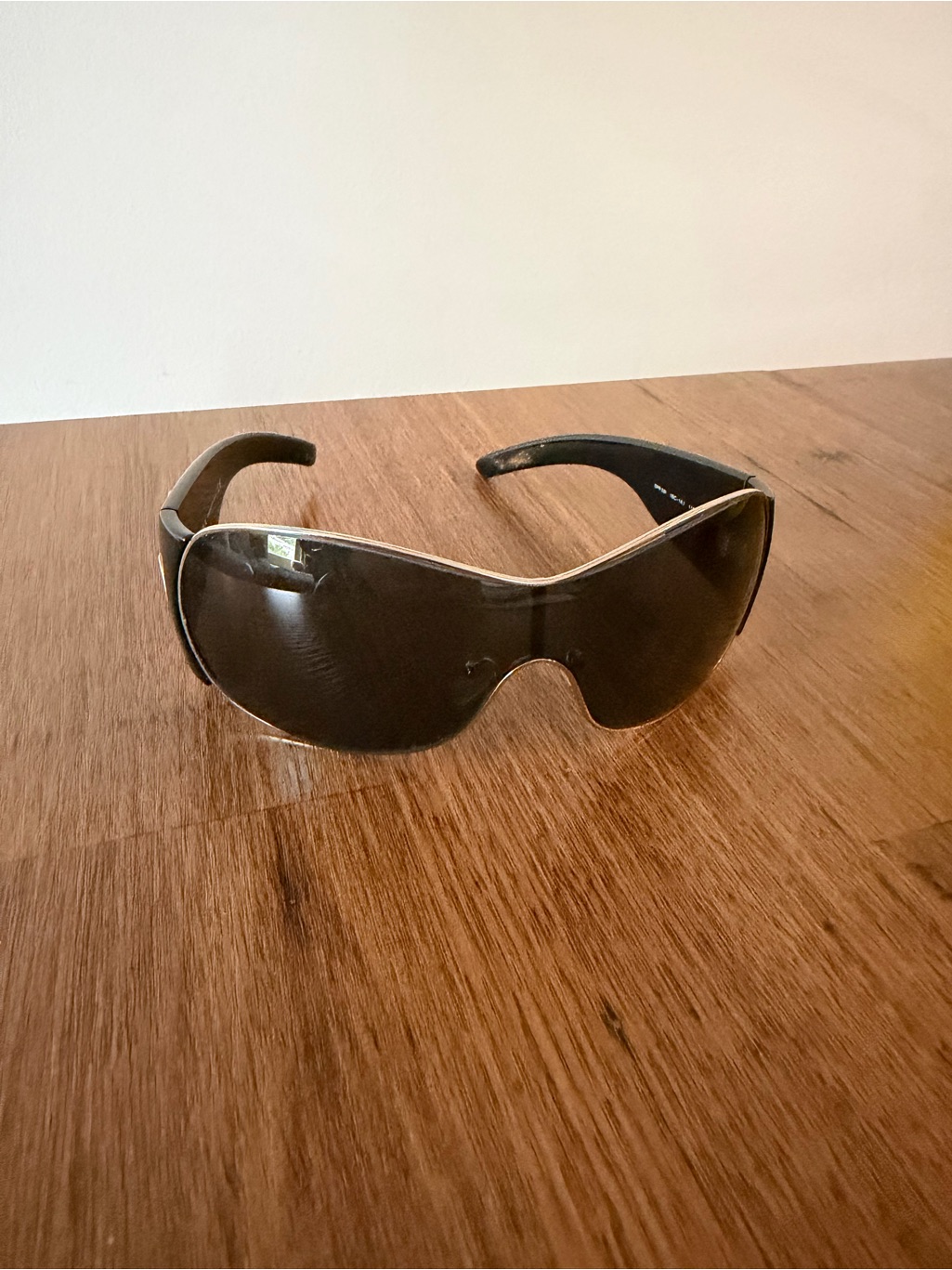 Prada Black Sunglasses With Gold Logo Accent